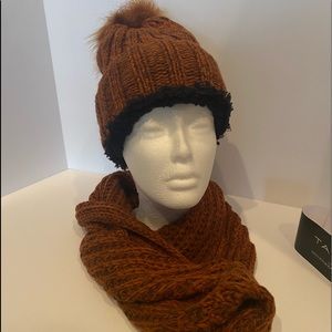 Tahari 2 piece set. Pom beanie and matching infinity scarf.
